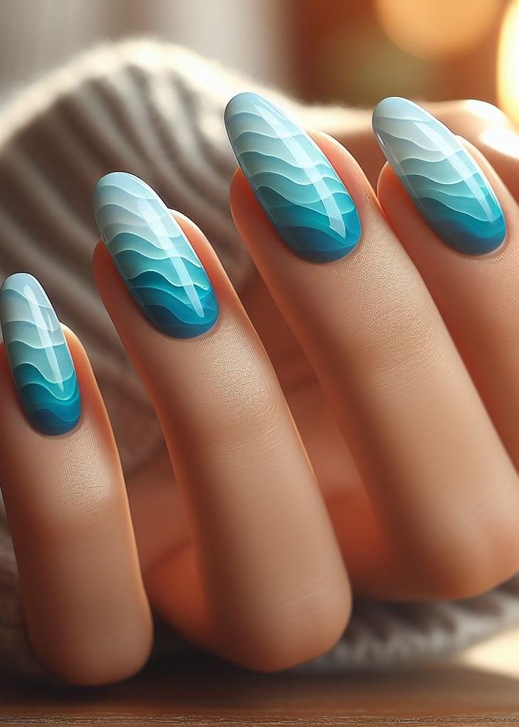 Feeling blue? Not anymore! This blue to teal ombre is the perfect pick-me-up mani with beachy vibes.