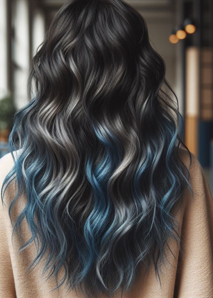 Dimension & Drama: Blue Highlights Elevate Wavy Hair. Teal highlights add depth and drama to thick, wavy hair, creating a captivating mane.