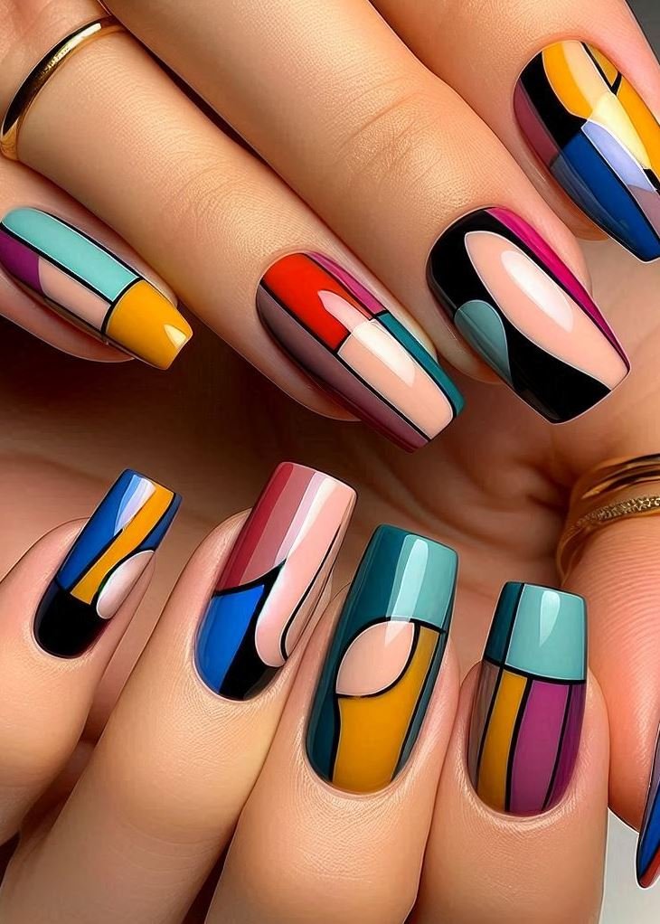 Abstract Nail Art: It's Not Just Random Splotches (We Promise!) | Pocoko Ditch the Dots, Embrace the Blocks: Color Blocking Nails Feeling like your nails need a bold upgrade? Ditch the dainty dots and say hello to Color Blocking Nails! Play with contrasting or complementary colors, painting each nail a solid block for a graphic and eye-catching design. It's like a mini modern art exhibit on your fingertips!